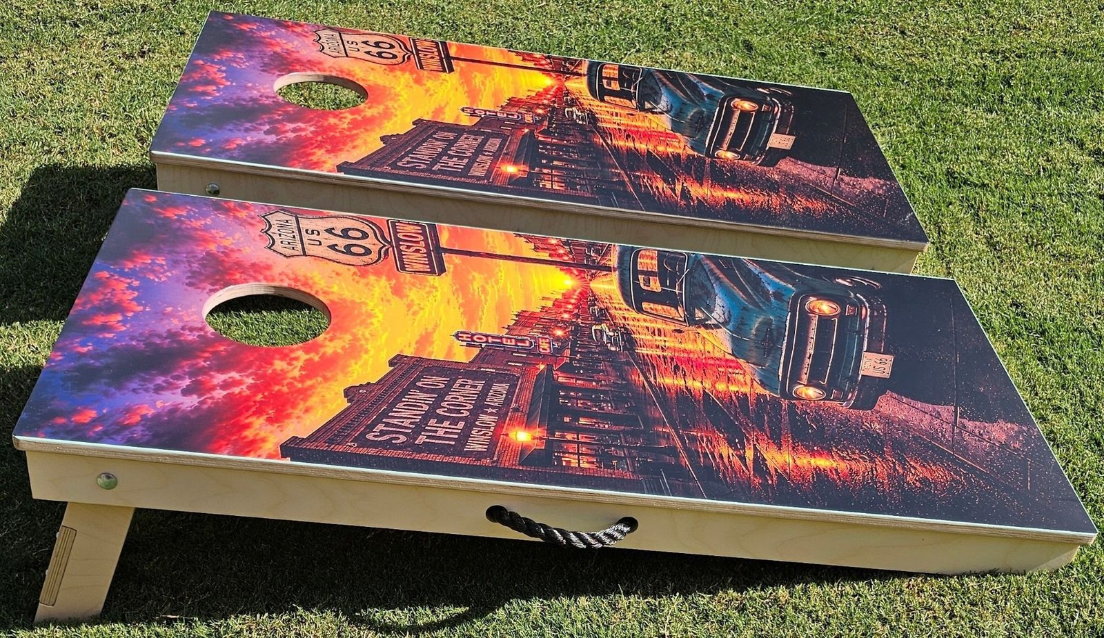 Sunset on 66 completed cornhole boards — Angle View